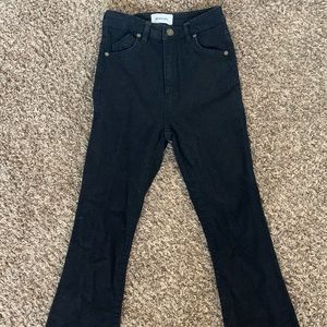 Rolla’s size 24 black slim fitted flared bell bottom jeans - distressed bottom